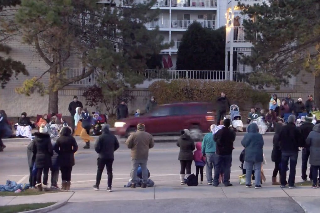 A red SUV sped through a holiday parade crowd in Waukesha, Wisconsin, on Sunday, killing at least five and injuring 40. Photo: Screenshot of City of Waukesha live-stream