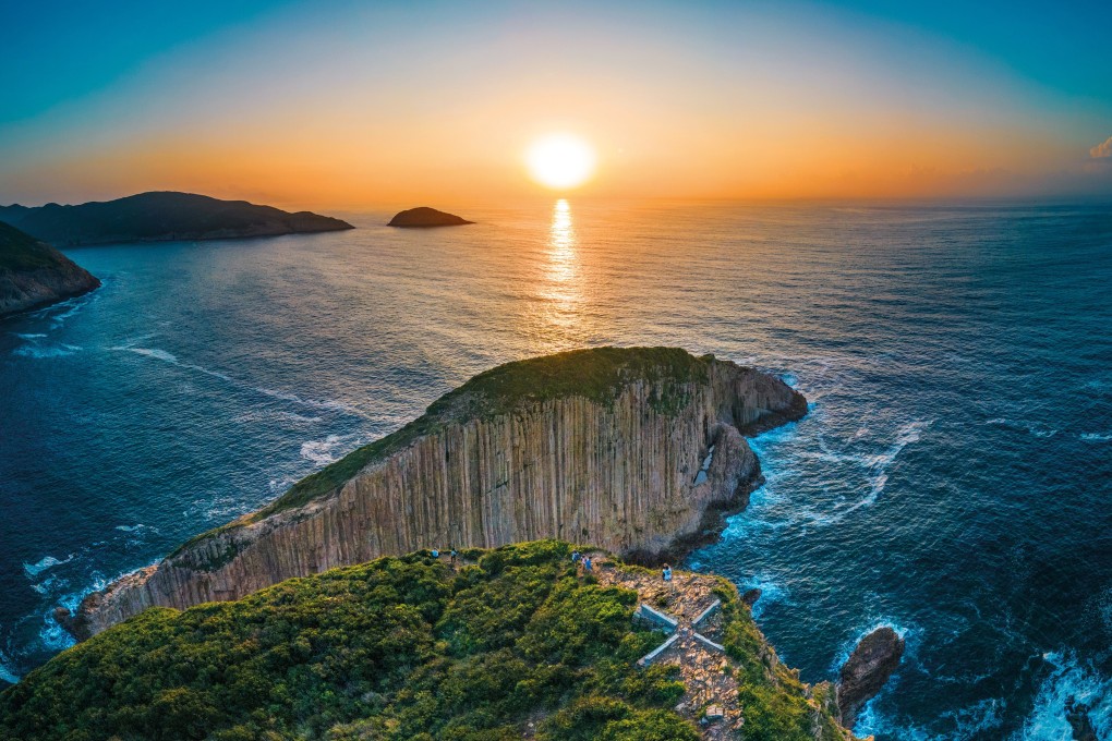 Sunset over Hong Kong’s triangular Po Pin Chau sea stack – separated from the Fa Shan headland by sea erosion – close to High Island Geo Trail in eastern Sai Kung Peninsula.
