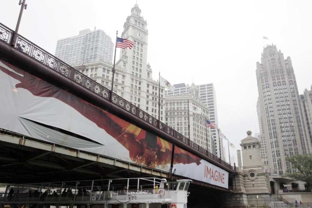 Tribune Tower is seen on the right of the Michigan Avenue bridge in downtown Chicago. Tribune Media has hired a real estate investment banker to explore the sale of Tribune Tower. Photo: AP