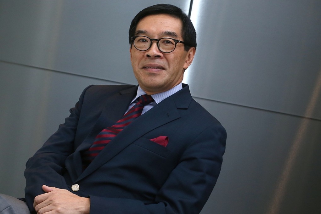 Hong Kong SFC chairman Carlson Tong Ka-shing poses in his office in the city’s Central business district. Photo: David Wong