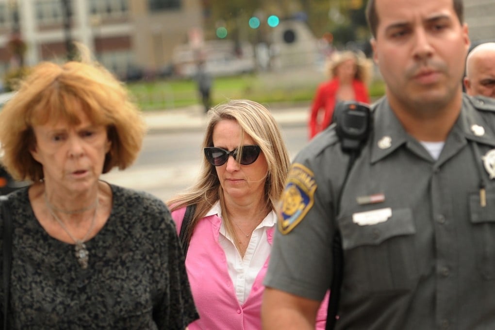 Jennifer Connell (centre) said filing the lawsuit was her only avenue to collect the cost of her medical bills from the homeowners’ insurance policy of the child's parents. Photo: AP