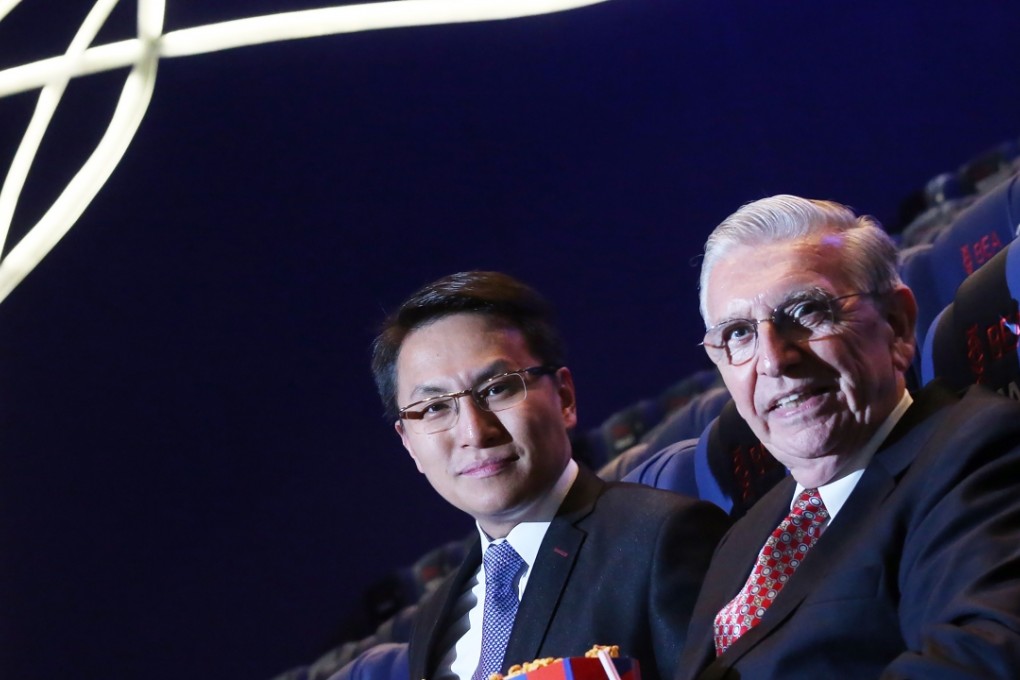 Lark International Multimedia Managing Director Ivan Wong(L) and Advisor Bob Vallone, whose experience in the movie industry spans half a century, pose for photographers in Hong Kong. Photo: K.Y. Cheng
