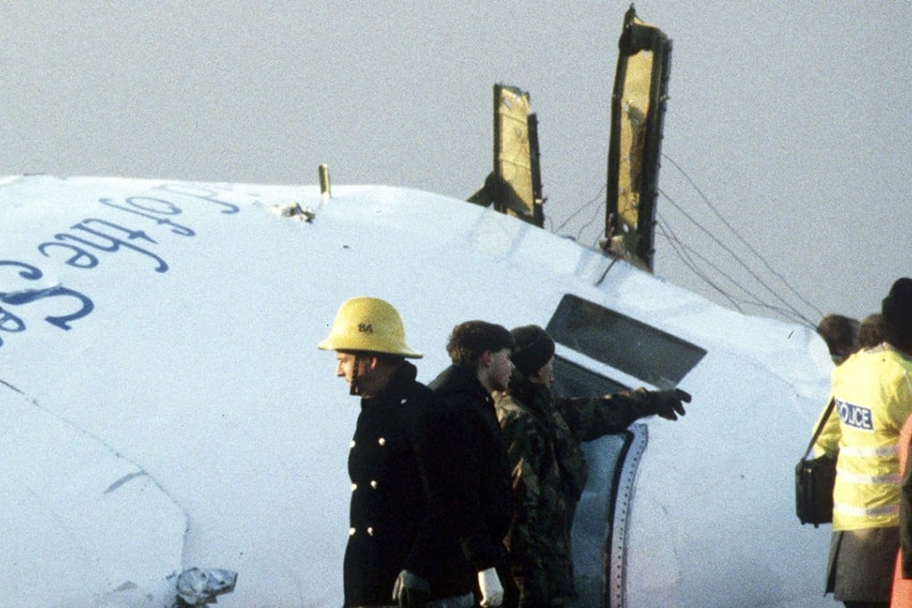 Scottish rescue workers and crash investigators search the area around the cockpit of Pan Am flight 103, which crashed near Lockerbie, Scotland on December 23, 1988, killing 270 people. Photo: Reuters