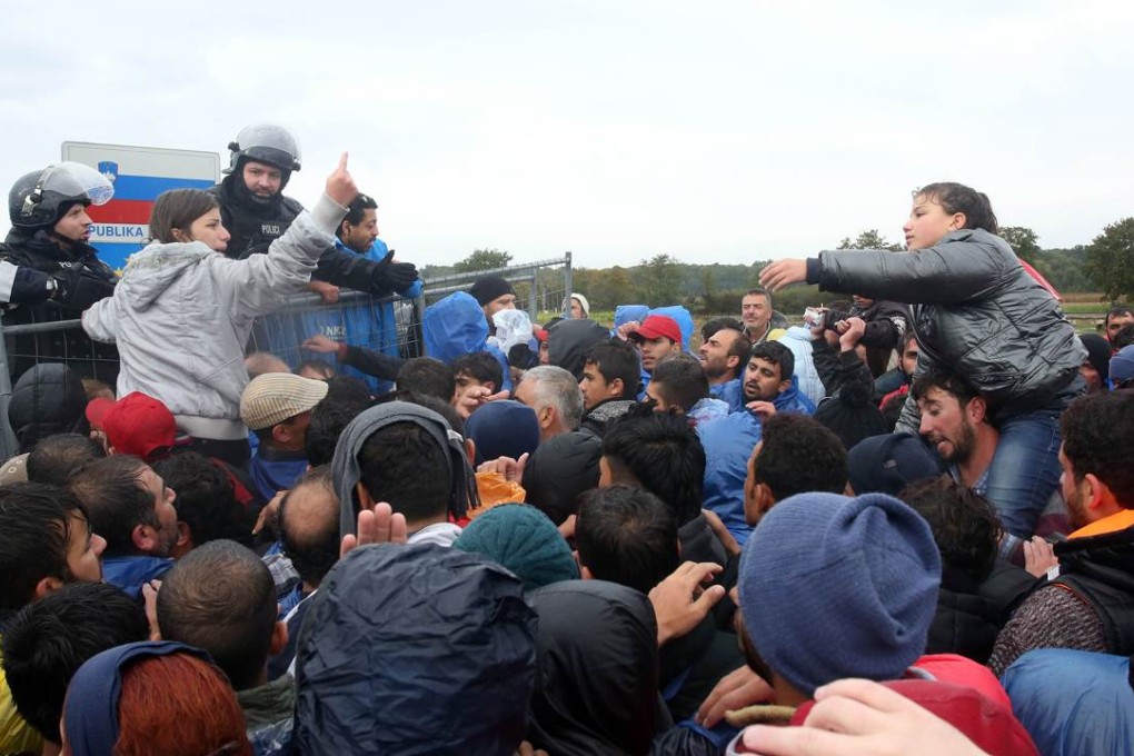 Refugees cross the Croatia-Slovenia border. Photo: AFP