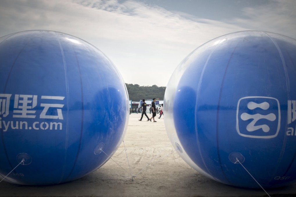 Giant balloons promoting AliCloud, the cloud-computing arm of Alibaba Group, are on display at the 2015 Computing Conference in Zhejiang’s Hangzhou on October 14. PHOTO: Bloomberg