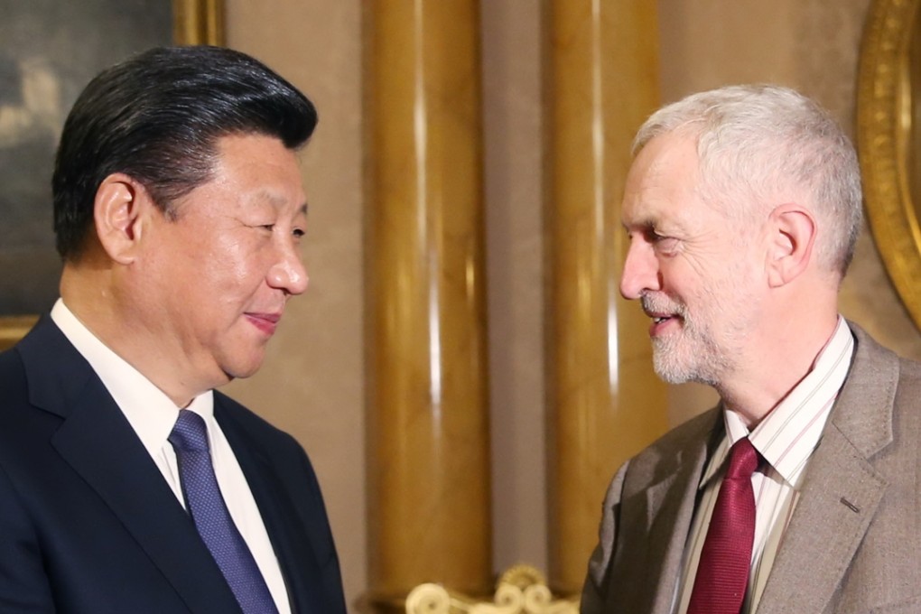 Chinese President Xi Jinping (L) meets with British Labor leader Jeremy Corbyn in London. Photo: Xinhua