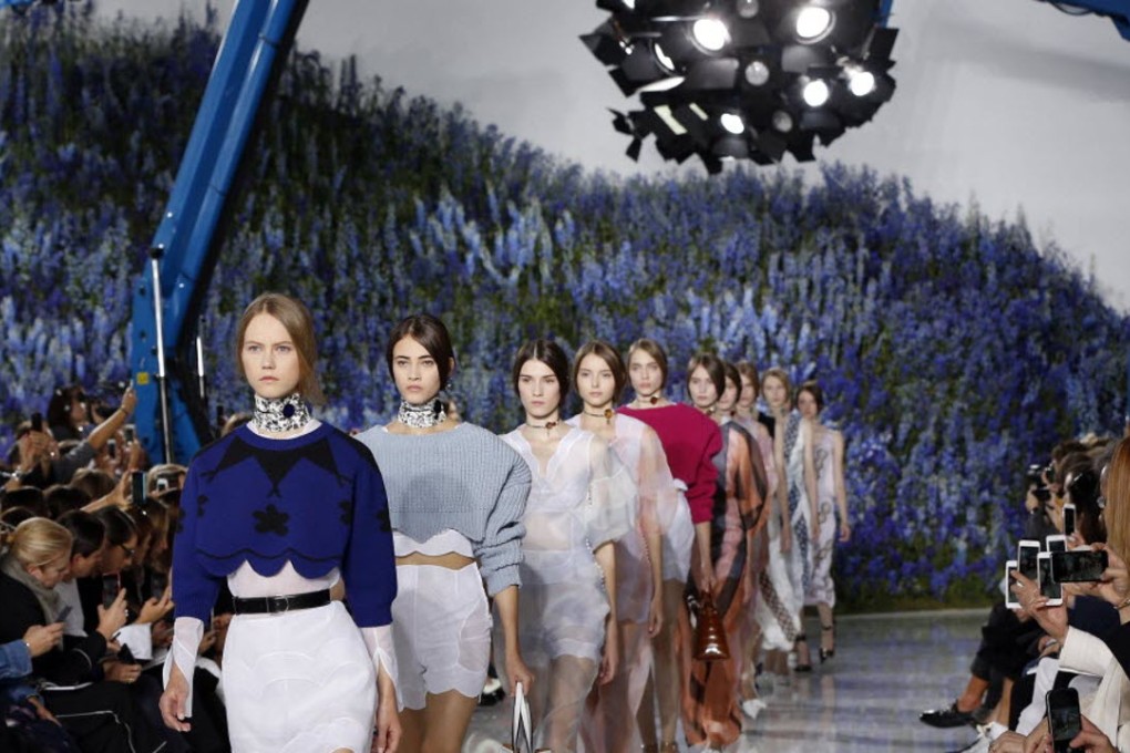 Models present what turned out to be Raf Simons’ last collection for Dior. Photos: EPA