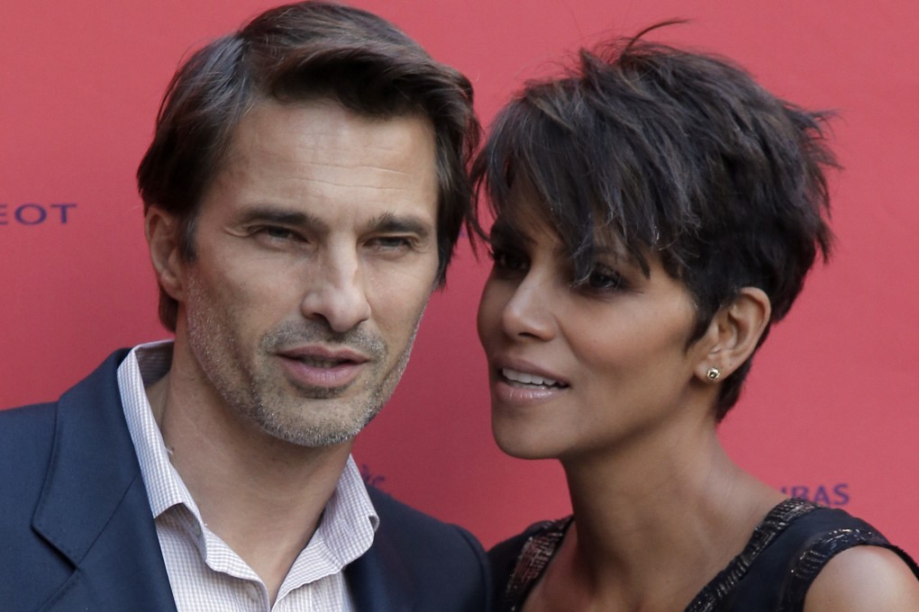 Halle Berry and then-fiance Olivier Martinez pose together on the red carpet of the Champs-Elysees Film Festival in Paris in 2013. The couple filed for divorce this week. Photo: AP