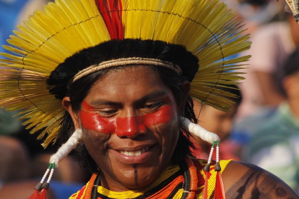 PALMAS, Oct. 28, 2015 (Xinhua) -- An indigenous person smiles during the first World Indigenous People Games, in Palmas, state of Tocantins, Brazil, on Oct. 27, 2015. The World Indigenous People Games will be held until Oct. 31 with the participation of 1,800 indigenous athletes of which 1,100 are Brazilian ethnicities and other 700 came from 23 countries.