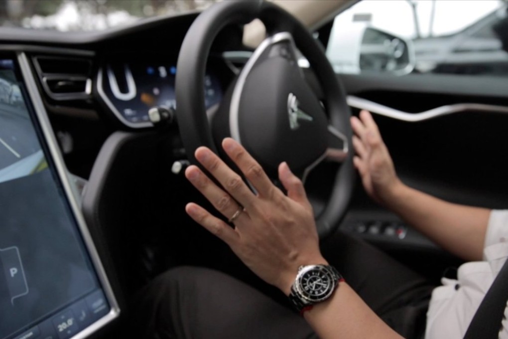 SCMP invited Locky Law, the Tesla owner representative at Charged Hong Kong, to test drive Tesla's new version of its 'autopilot' system in the city.