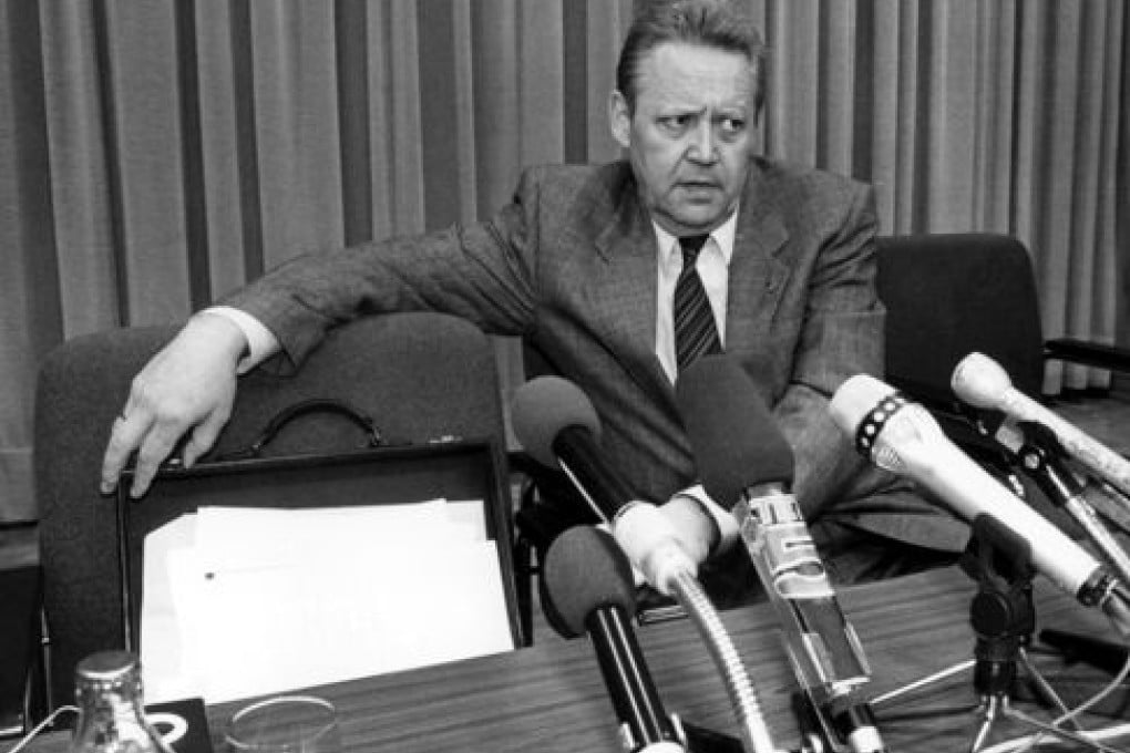 The press conference of November 9, 1989, at which Guenter Schabowski announced that visas would be freely granted to those wanting to travel outside East Germany. Photo: AFP