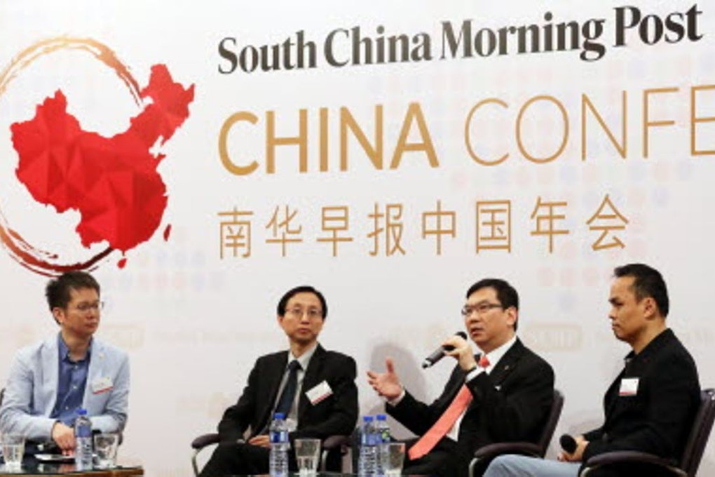 Alex Wang, vice president of CTO Group, ZTE Corp. (second from left) is shown at the SCMP China Conference in Hong Kong on Monday. Photo: Nora Tam