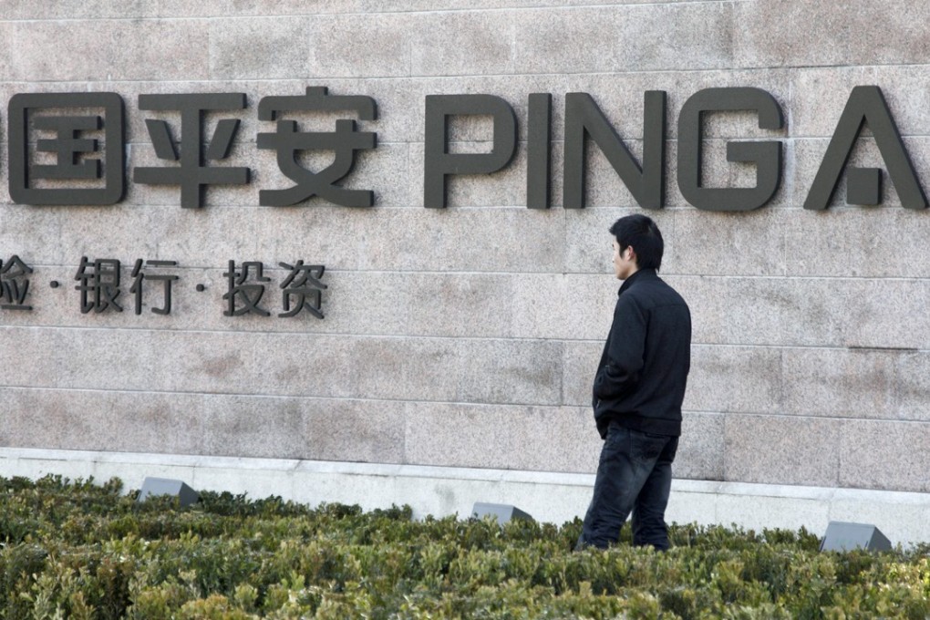 Ping An Insurance (Group) Company of China, Ltd., CFO Jason Yao (left), meets the media in a video press conference on Ping An 2015 Interim Results at Conrad Hong Kong in Admiralty. 21AUG15