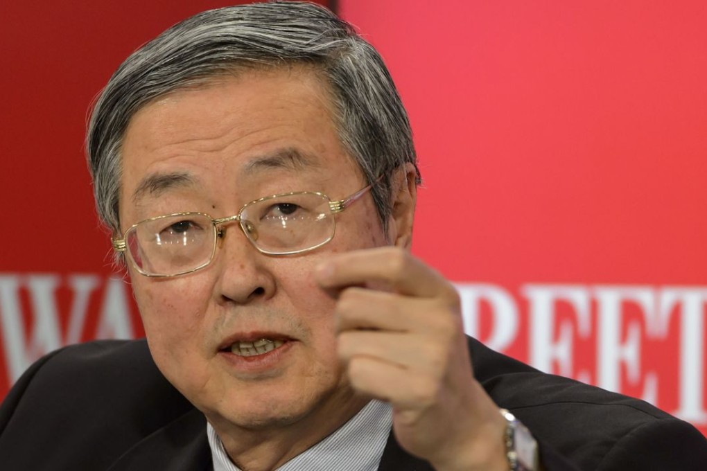 People’s Bank of China Governor Zhou Xiaochuan attends a session of the World Economic Forum (WEF) after his reported article on the Shenzhen-Hong Kong stock connect roiled the markets. The PBOC clarified the article came from excerpts of a speech delivered six months ago. Photo: AFP