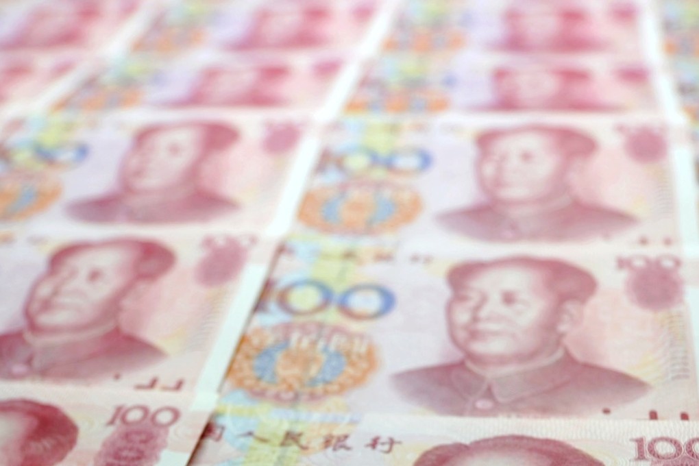A stack of shows 100 yuan Chinese banknotes. The International Monetary Fund is expected to add the yuan to its basket of reserve currencies, known as Special Drawing Rights, in the coming months. Photo: Kyodo