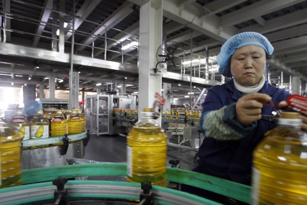 China’s new business model requires bolstering the service sector to offset a fall in manufacturing activity, but addressing industrial overcapacity will take time. Photo: AFP