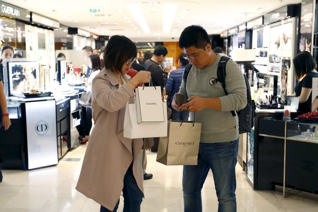 Customers visit the Galeries Lafayette department store in Paris as Chinese luxury consumers are spending more on ready-to-wear and new labels, a notable shift in the behaviour and tastes of the world's top spenders as Asia’s household debt explodes higher. Photo: Reuters