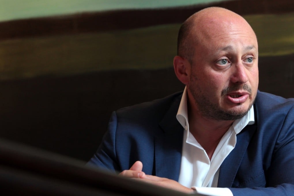 Australian developer Larry Kestelman, CEO of the LK Group, poses for a photograph at the Club Lounge in Grand Hyatt, Wan Chai on October 27. Photo: Bruce Yan