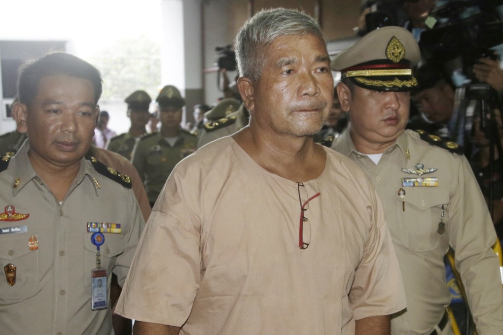 Senior adviser to the Royal Thai Army Liutenant General Manas Kongpaen (right) is one of dozens of suspects allegedly involved in the human trafficking of Rohingya migrants. Photo: AP