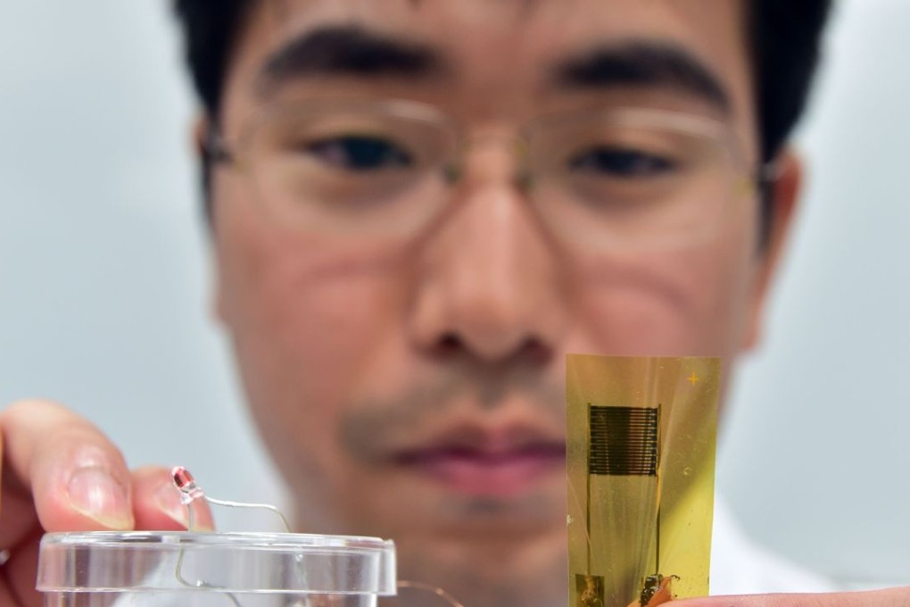 An ultra-thin flexible thermal sensor on a plastic film at the laboratory of professor Takao Someya of the University of Tokyo. Photo: AFP