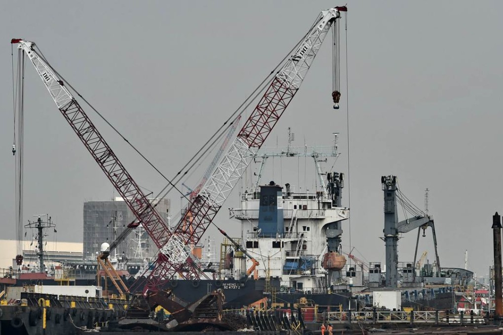 Vessels undergoing repair are seen at a yard in Singapore as countries who signed onto the Trans Pacific Partnership face an uphill fight to win ratification in countries such as the US. Photo: AFP