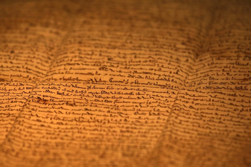 One of the few surviving copies of Magna Carta, written in 1217 on sheep skin, will be displayed at an exhibition in Hong Kong till November 14. Photo: Reuters