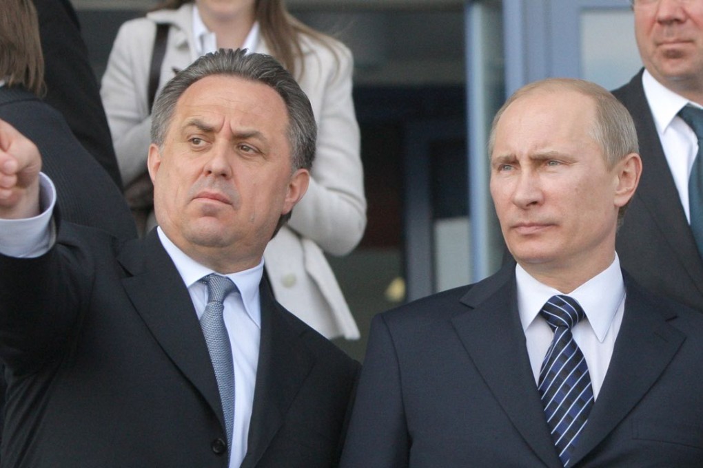 Russian President Vladimir Putin with Sports Minister Vitaly Mutko, who has said he is ready to put forward a road map. Putin has remained silent on the allegations of state-sanctioned doping. Photo: AP