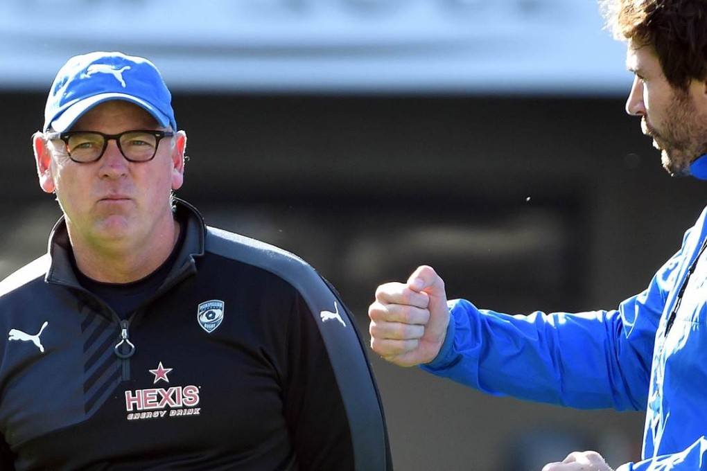 Montpellier coach Jake White waits for the start of the French Top 14 match against Toulouse. Photo: AFP