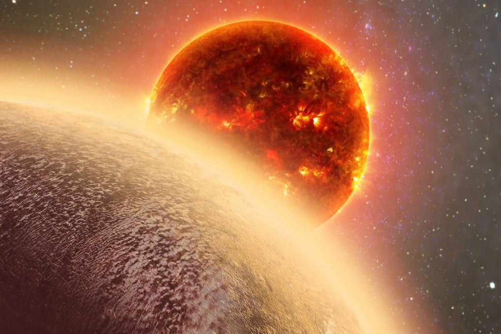 An artist’s conception provided by Nasa shows GJ 1132b, foreground, a rocky planet similar to the Earth in size and mass, orbiting a red dwarf star. Photo: AP
