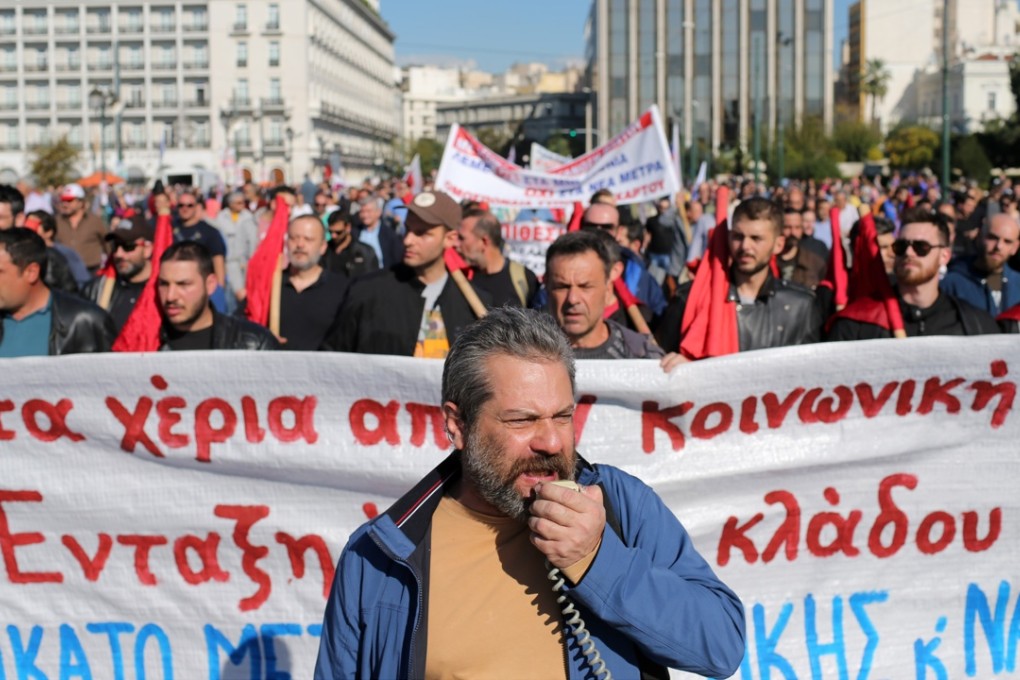 Members of the PAME Communist-affiliated union protest outside the Greek parliament during a 24-hour nationwide general strike in Athens. Photo: AP