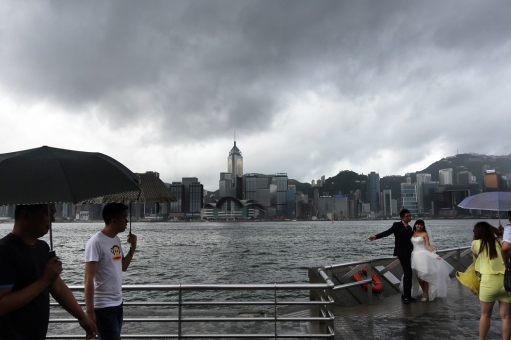 Stormy weather at Tsim Sha Tsui. The proposed health insurance reform is facing turbulent times. Photo: Sam Tsang