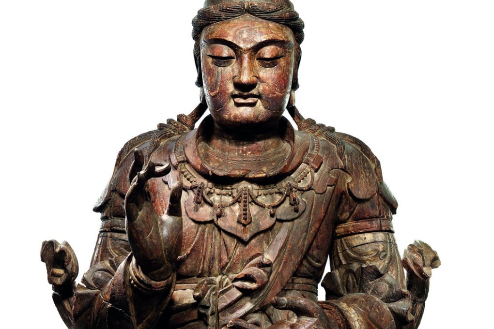 A wooden seated Guanyin figure from China’s Song dynasty (AD960-1279), part of Christie’s sale of Buddhist art. Photos: Christie’s