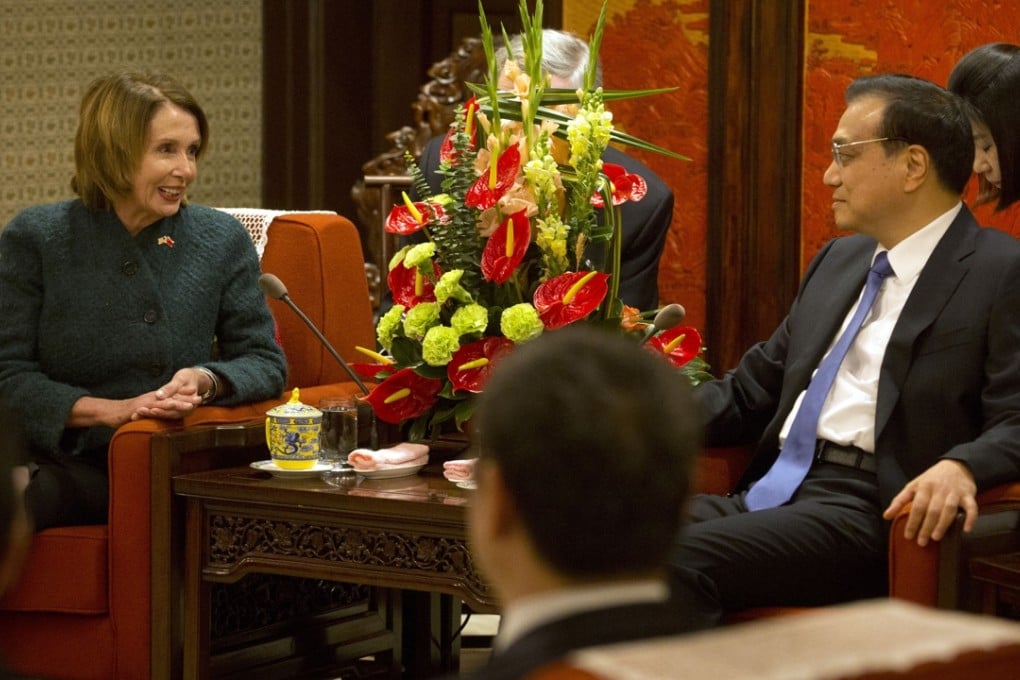 US House of Representatives Minority Leader Nancy Pelosi speaks to Chinese Premier Li Keqiang in Beijing. Photo: AP