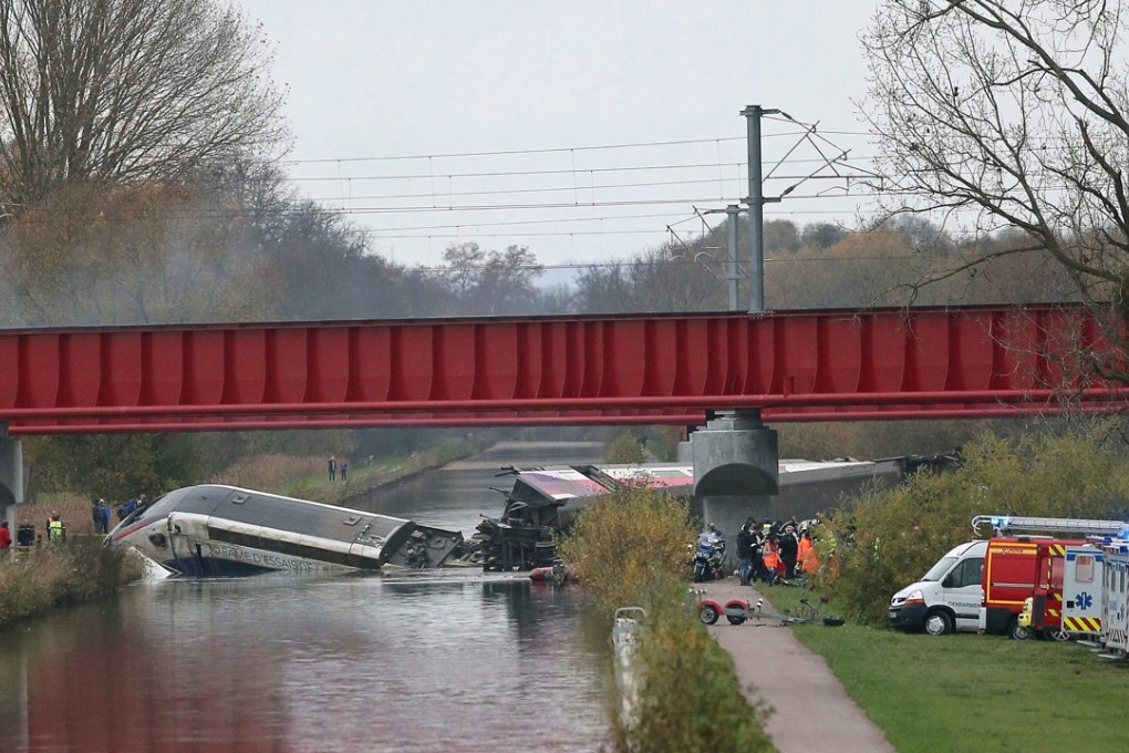 The crash scene of the doomed TGV train that fell from a bridge in Eckwersheim, near Strasbourg, France. Photo: EPA