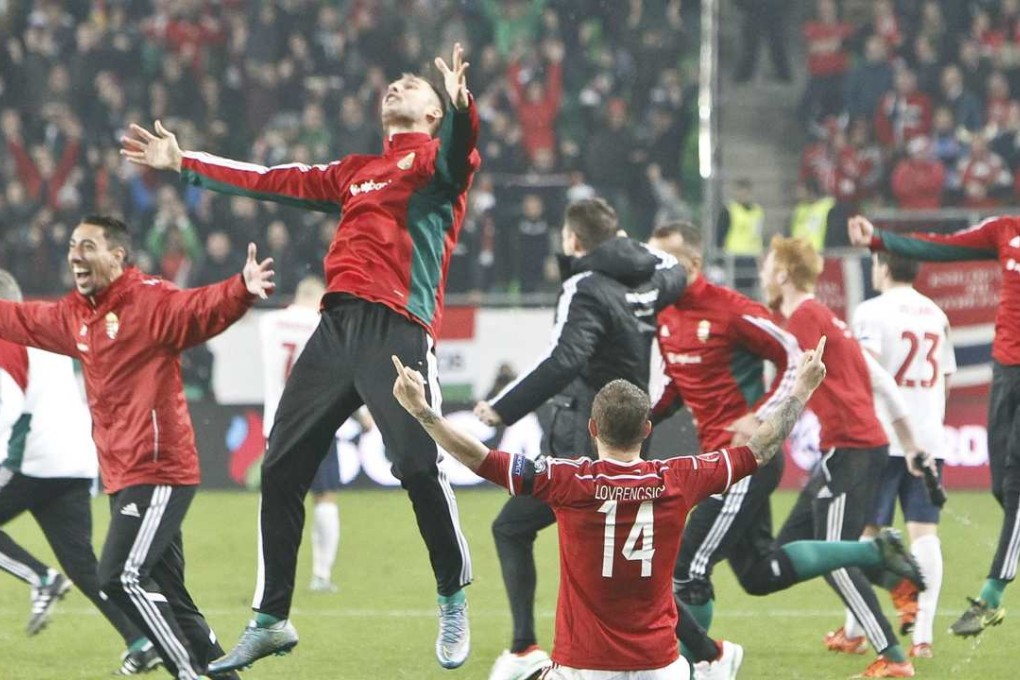 Hungary’s players celebrate after beating Norway 2-1 to qualify for Euro 2016 in France. Photo: Reuters