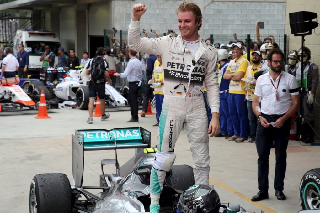Mercedes driver Nico Rosberg celebrates after winning the Brazilian Grand Prix in Sao Paulo. Photo: Reuters