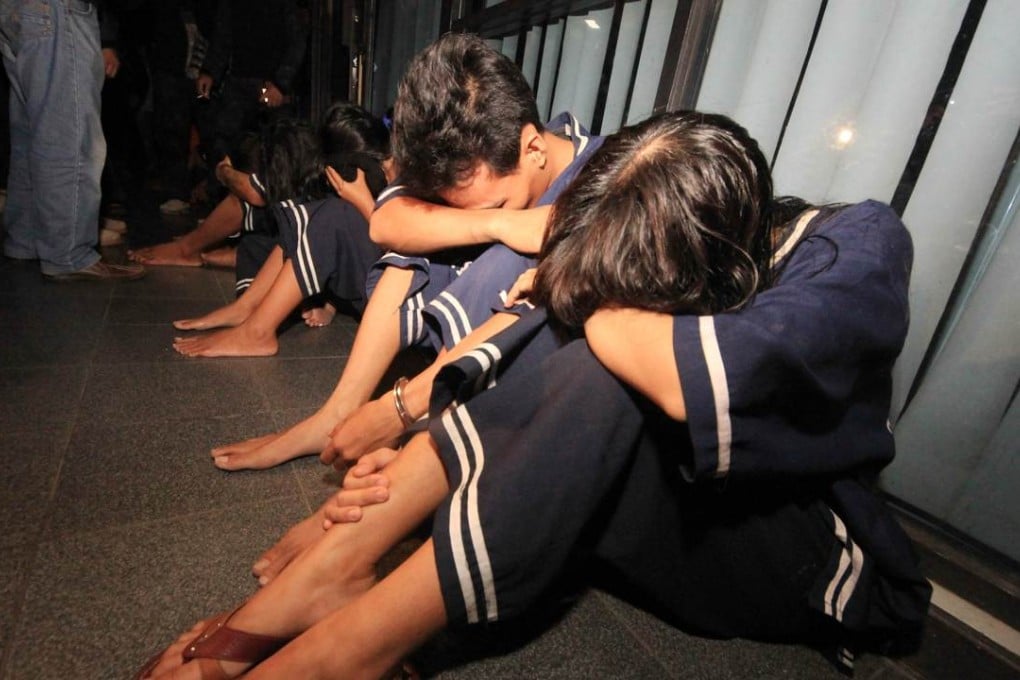 Suspected murderers Rudi Efendi and his wife Nuriah are accused of dining on the genitals of a man believed to have raped Nuriah before her wedding. Photo: AFP