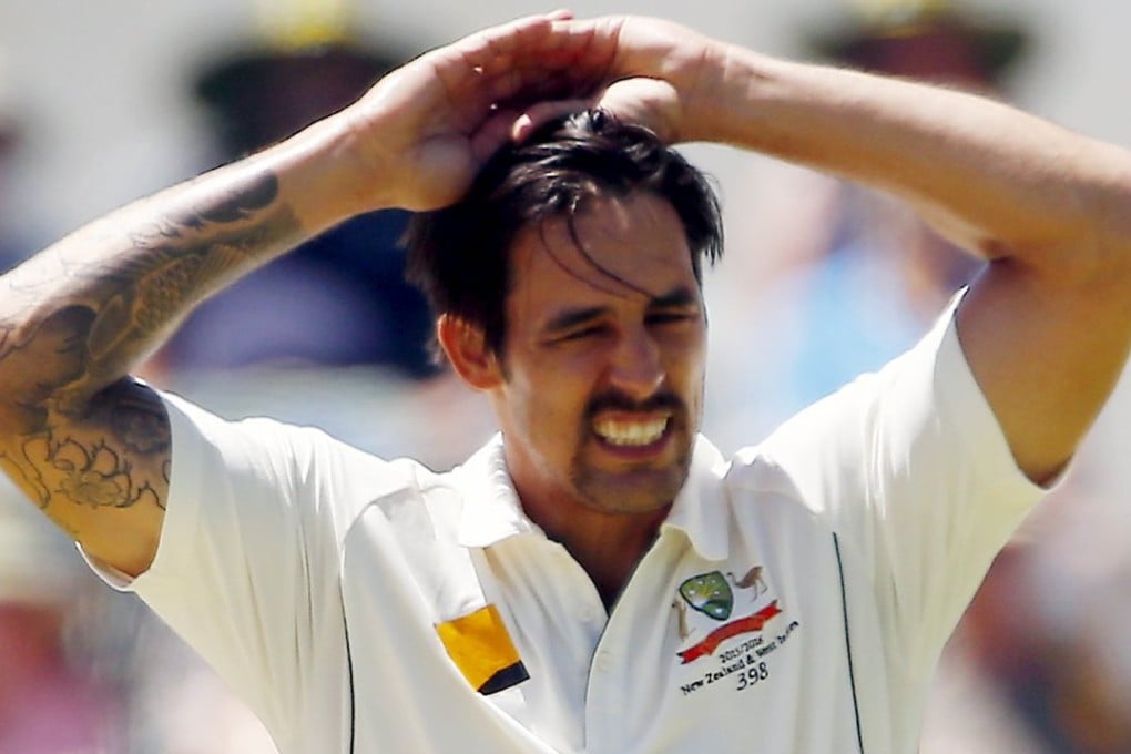 Mitchell Johnson watches another ball go to the fence as the New Zealand batsmen feasted on his bowling in the first innings of the second test at the Waca ground in Perth. Photo: Reuters