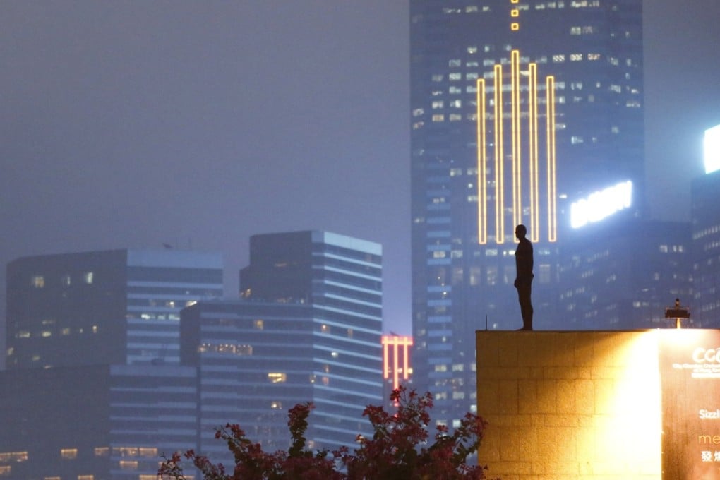 A “naked man" sculpture created by British artist Antony Gormley looks out over Central. There are concerns that a few vulnerable people may see the art installation as a suggestion to jump into space. Photo: AP