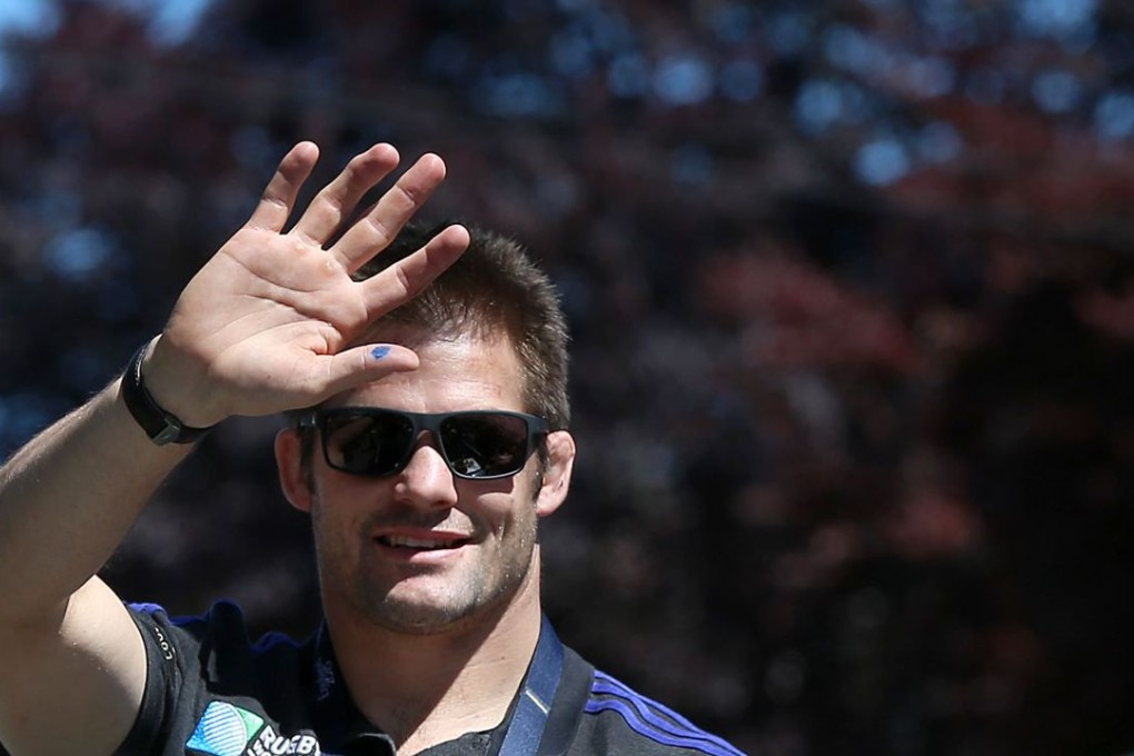 Richie McCaw waves at a recent welcome parade for the World Cup winners in Christchurch. Photo: AFP
