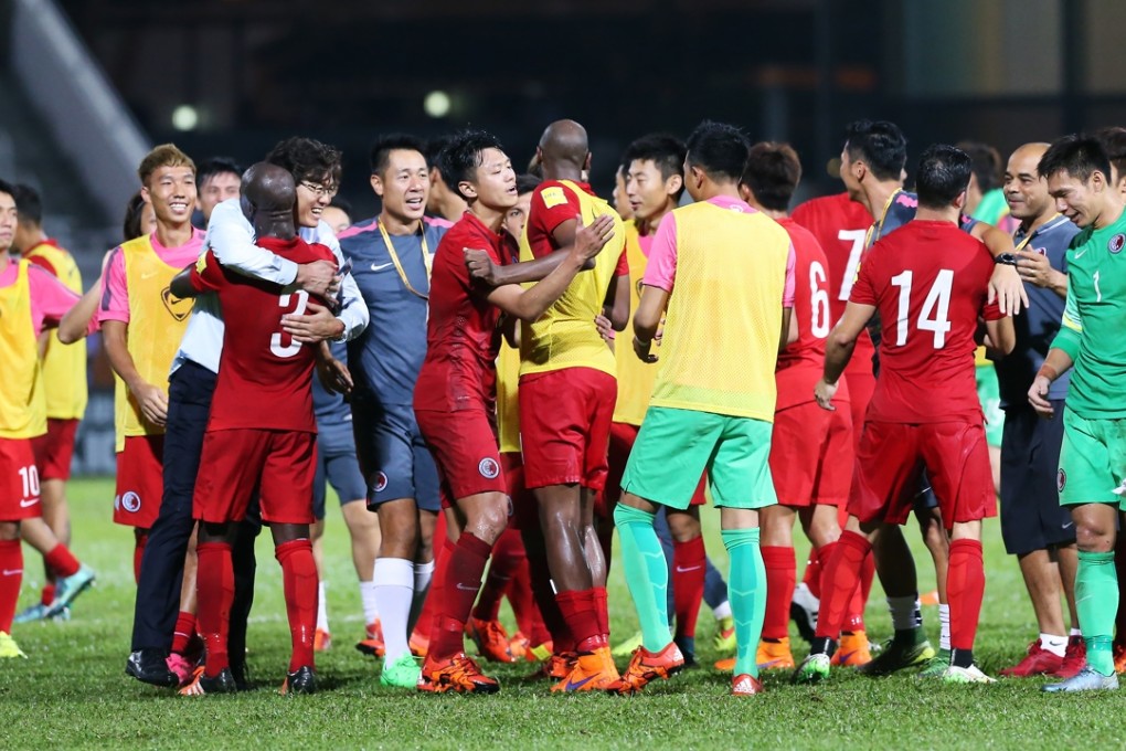 The Hong Kong players celebrate after the soccer World Cup qualifier at the Mong Kok Stadium. Photo: K.Y. Cheng
