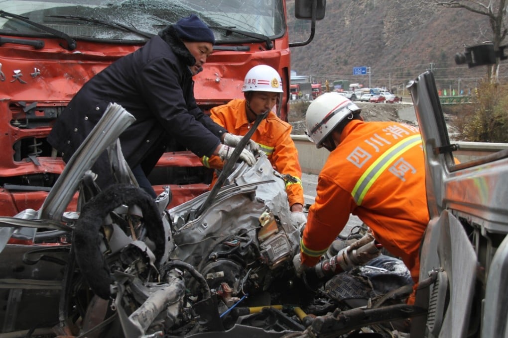 Rescuers work at the site of a road accident in Anhong Township, Sichuan Province. Car accidents remain the major cause of death for Chinese under 45. Photo: Xinhua