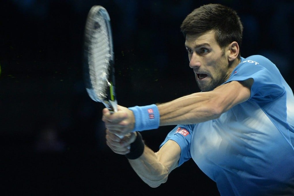 Serbia's Novak Djokovic in action against Spain's Rafael Nadal during their semi-final match at the ATP Tour tennis finals at the O2 Arena in London. Photo: EPA