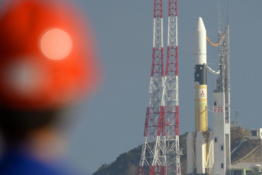 Japan’s H-2A rocket carrying its first commercial satellite, a Canadian telecommunications satellite. Photo: Kyodo