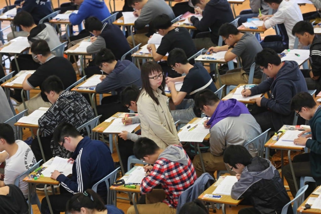 Students sit for the Hong Kong Diploma of Secondary Education exam this year at a school in Sham Shui Po. Photo: SCMP Pictures
