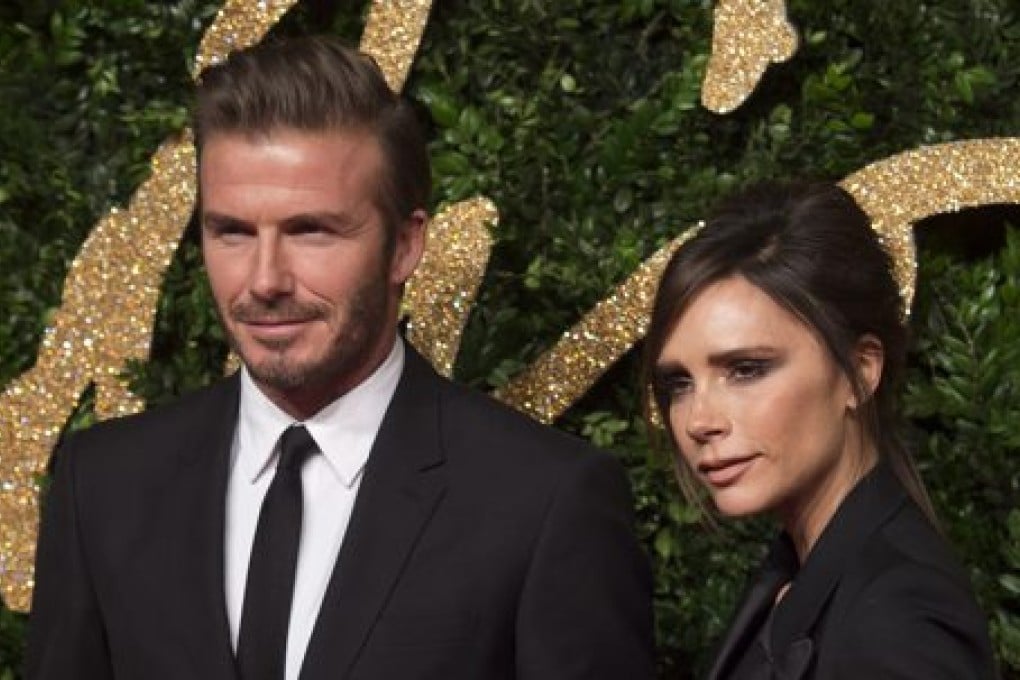 David Beckham and his wife, designer Victoria Beckham at the annual British Fashion Awards in Central London. Photo: EPA