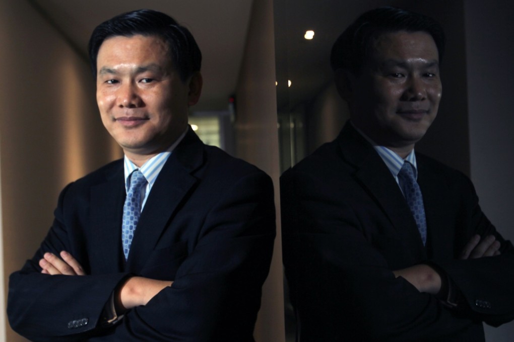 A file photo of Yim Fung, Vice Chairman and CEO of Guotai Junan International Holdings Ltd. pictured in his office at Grand Millennium Plaza, Central on June 2010. Photo: SCMP