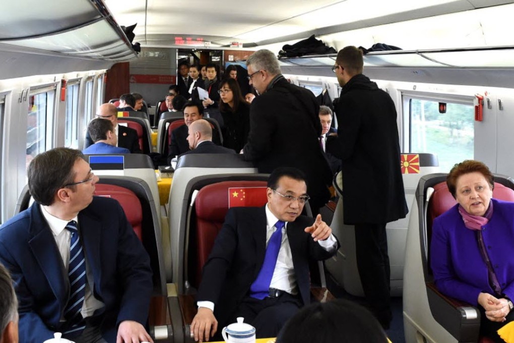 Chinese Premier Li Keqiang (pointing) joins leaders attending the fourth China and Central and Eastern European countries leaders’ meeting on a China-made bullet train from Suzhou to Shanghai. Photo: Xinhua