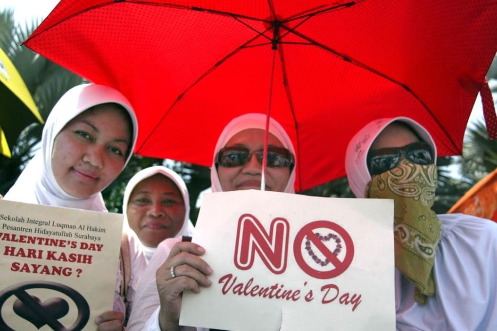 Protesters denouncing Valentine’s Day saying it promotes promiscuity, casual sex and consumption of alcohol in 2012. Authorities in Belopa say the removal of condoms will halt rising premarital sex. Photo: AFP