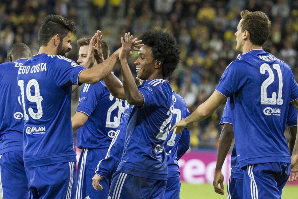 Willian celebrates his goal. Photo: AFP